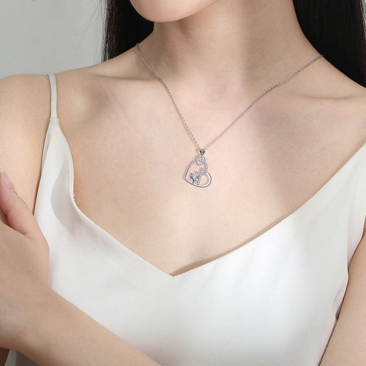 HEART-SHAPED CROSS INLAID NECKLACE